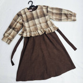 Buy a children's autumn coat and sundress set